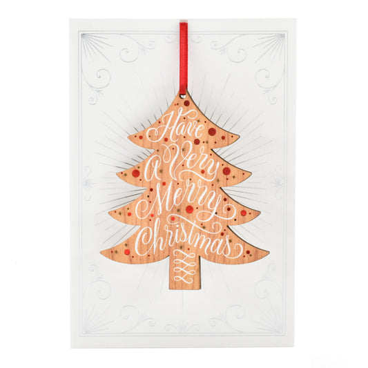 Hallmark Christmas card - Signature Ornament features a decorative wood style Christmas tree ornament with intricate lettering.