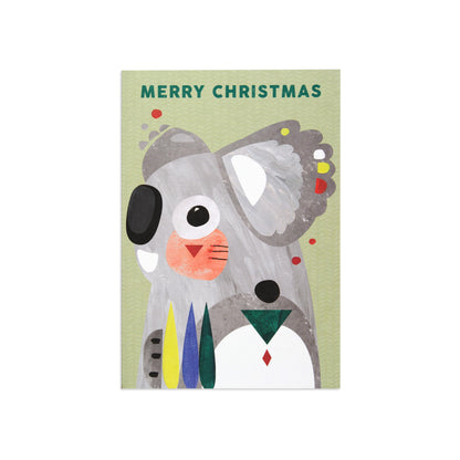 Christmas card - Pete Cromer Koala featuring a colourful koala illustration with debossed detailing on a textured green background.