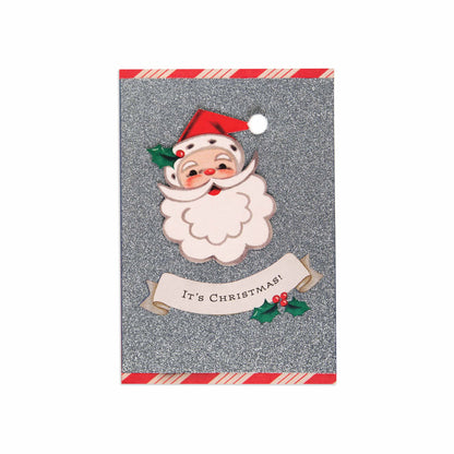 Christmas card - silver glitter Santa with a classic design featuring Santa Claus and festive holly accents.