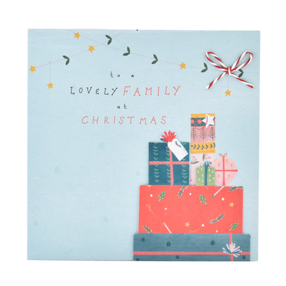 Hallmark Christmas card to a lovely family - Happy Moments featuring colourful gifts and 3D bow detail on a blue background.