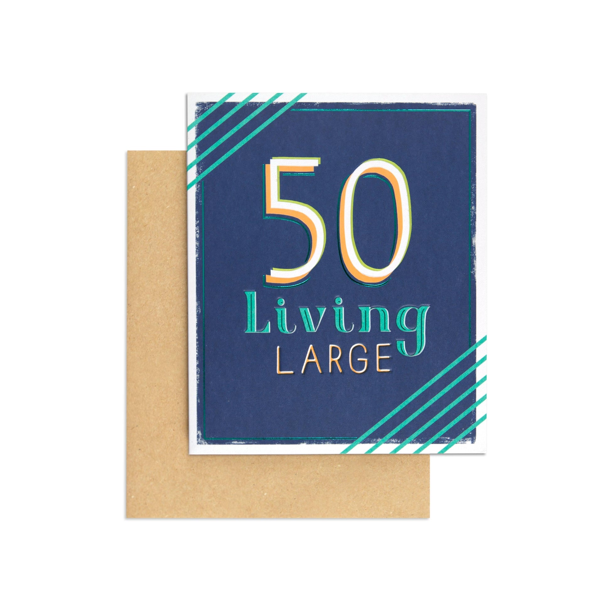 Living Large Stylish 50th Birthday Card featuring embossed text on a navy background with teal foil, alongside a kraft envelope.