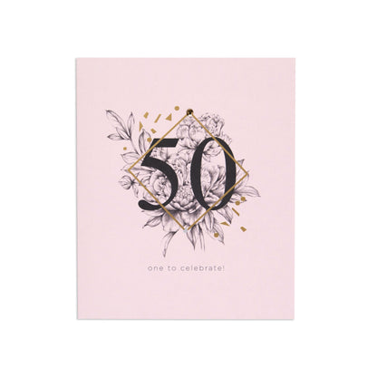 One To Celebrate Refined 50th Birthday Card with gold foil detailing and floral illustration in a pink background.