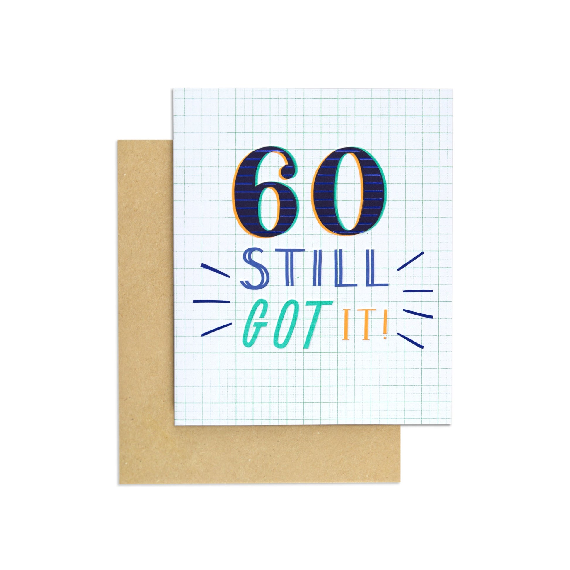 Still Got It Colourful 60th Birthday Card featuring colourful text on a grid background with a kraft envelope.