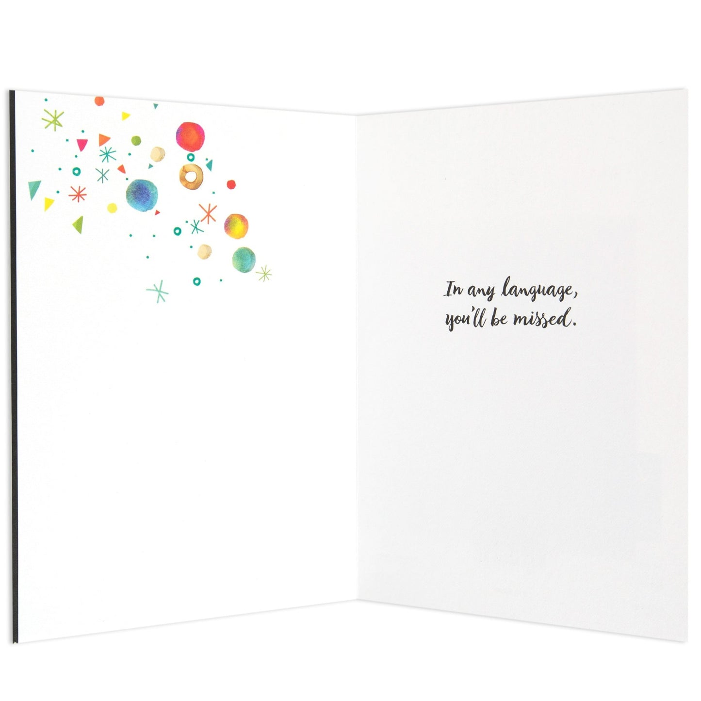 Space themed adorable farewell leaving card interior featuring colourful illustrations of planets and stars with message: 'In any language, you’ll be missed.'