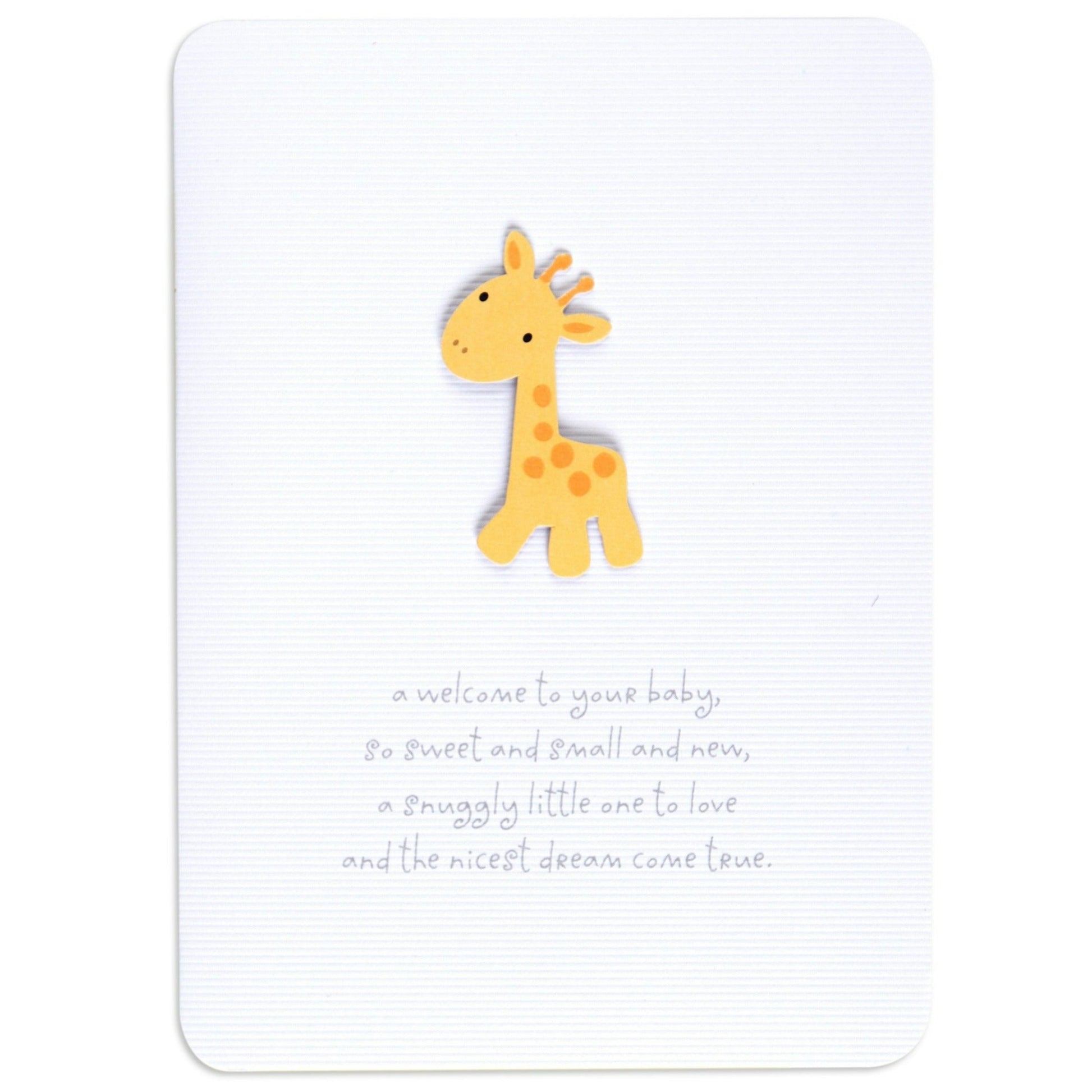 Sweet gender neutral giraffe new baby congratulations card featuring a cute laser cut giraffe on textured white card, flat lay view.