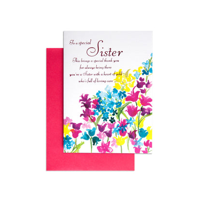 Special Sister Sweet Birthday Card with vibrant watercolour floral design and pink envelope featuring heartfelt message inside.