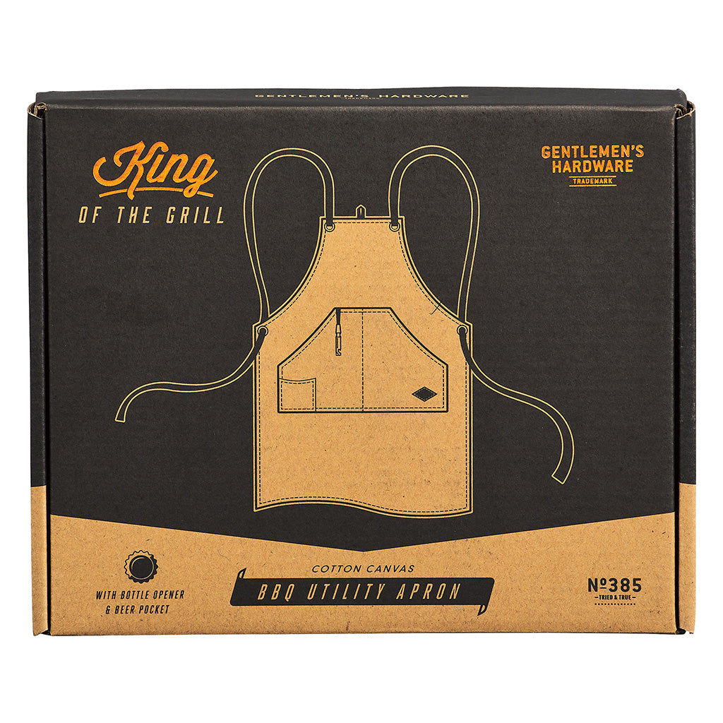 Utility apron & bottle opener in a gift box, featuring a cotton canvas design and barbecue-themed printing, flat lay view.