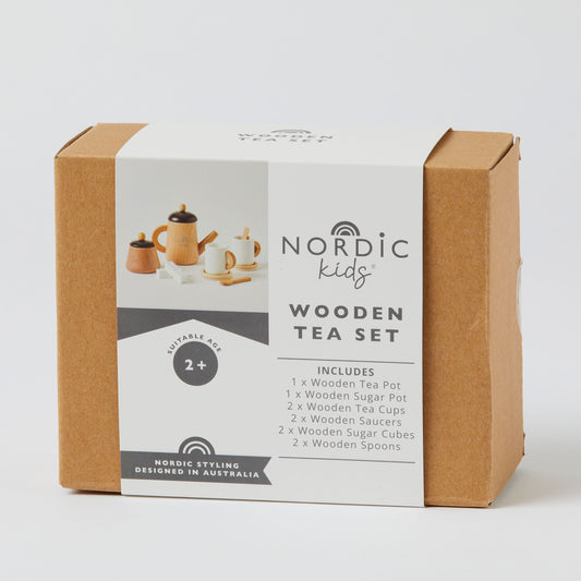 Wooden tea set in eco-friendly packaging, featuring a wooden teapot, cups, and accessories for toddlers.