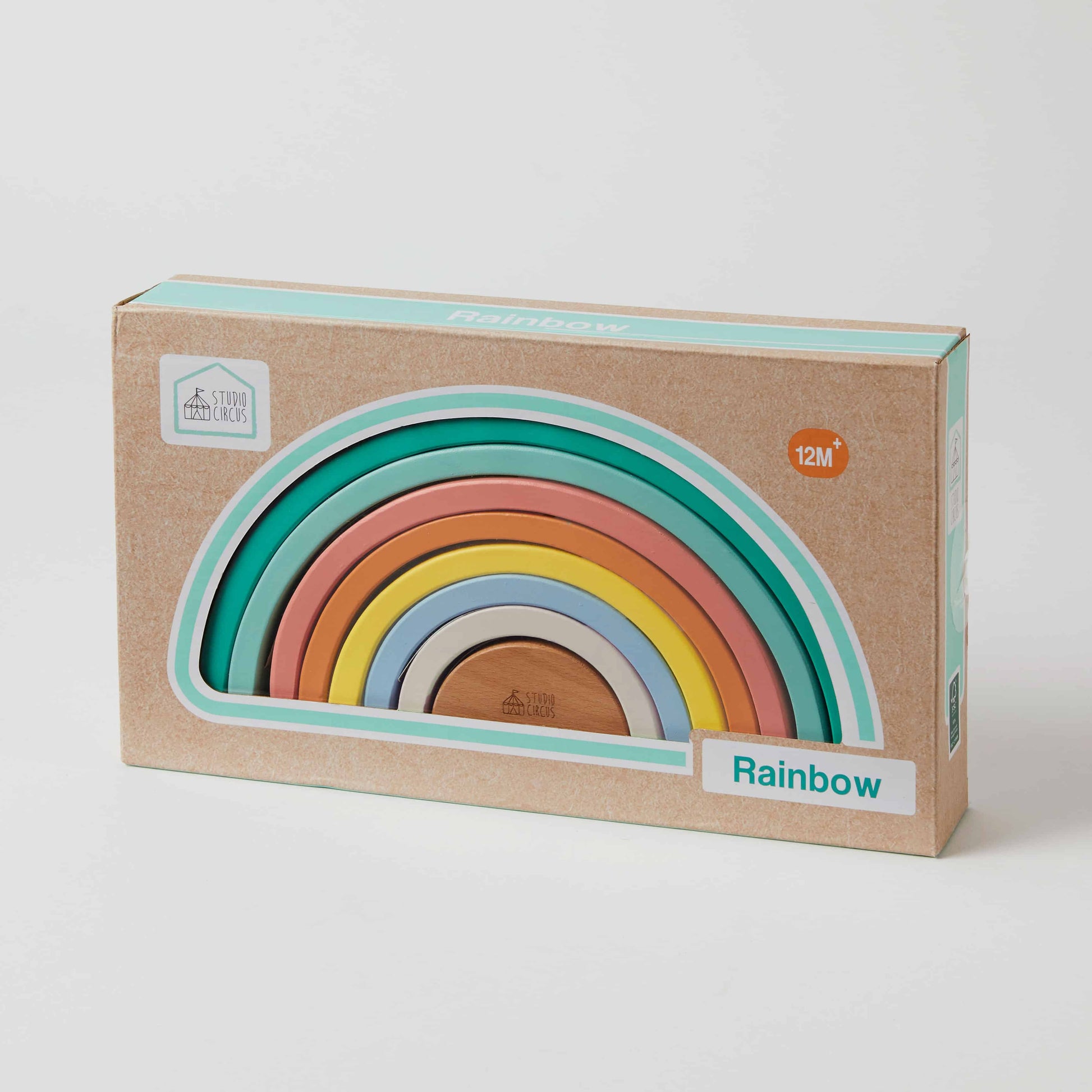 Rainbow stacker wooden toy in packaging, featuring semi-circular shapes in pastel colours, ideal for toddlers.