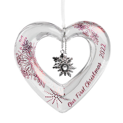 Our First Christmas Heart Glass — Hallmark Keepsake Ornament featuring snowflake charms and metallic detailing, close up view.