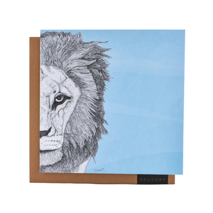 Leo the Lion by 'Dots by Donna'- Blank Card featuring a dot illustration of a lion on a blue background with a brown kraft envelope.